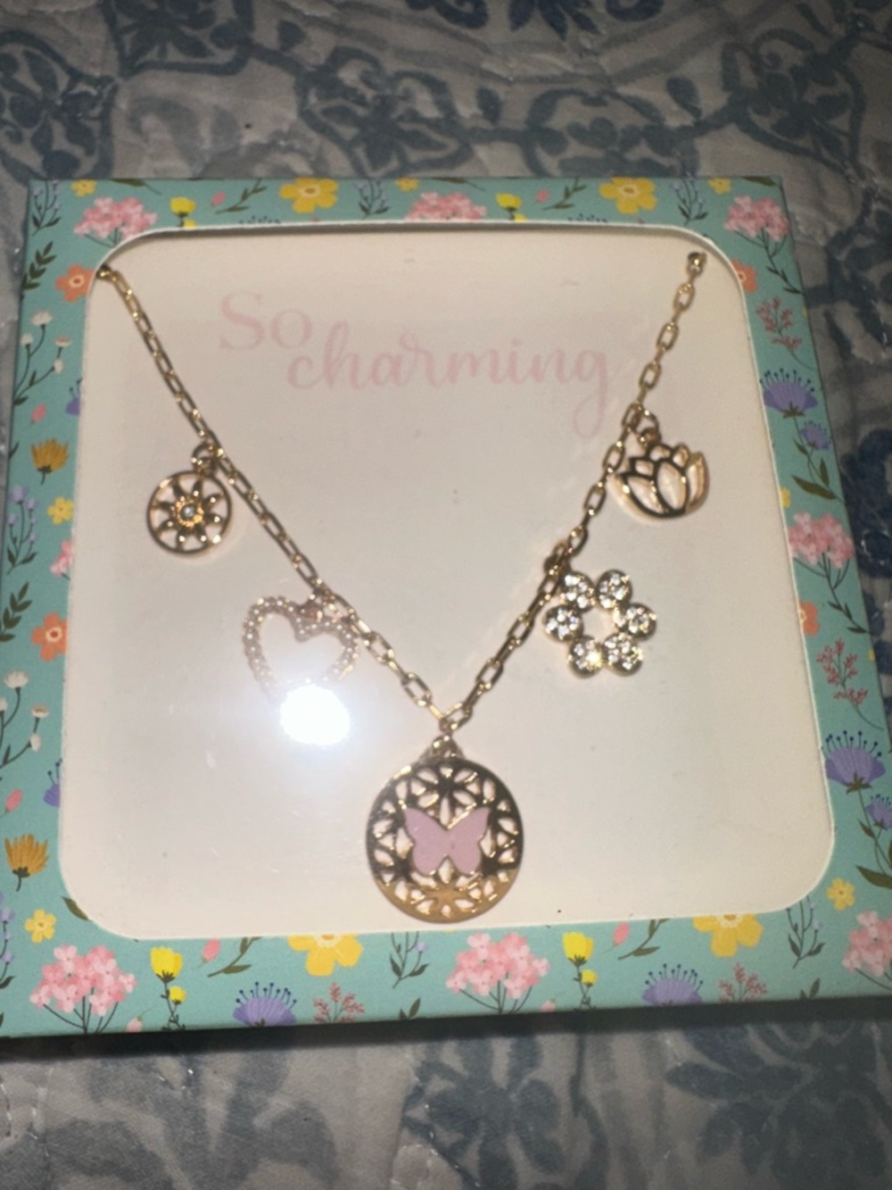 “So Charming” Gold Butterfly & Floral Charm Necklace – Gift‑Ready Set